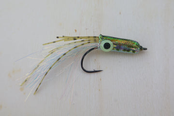 Fishing lure with a detailed design on a light background