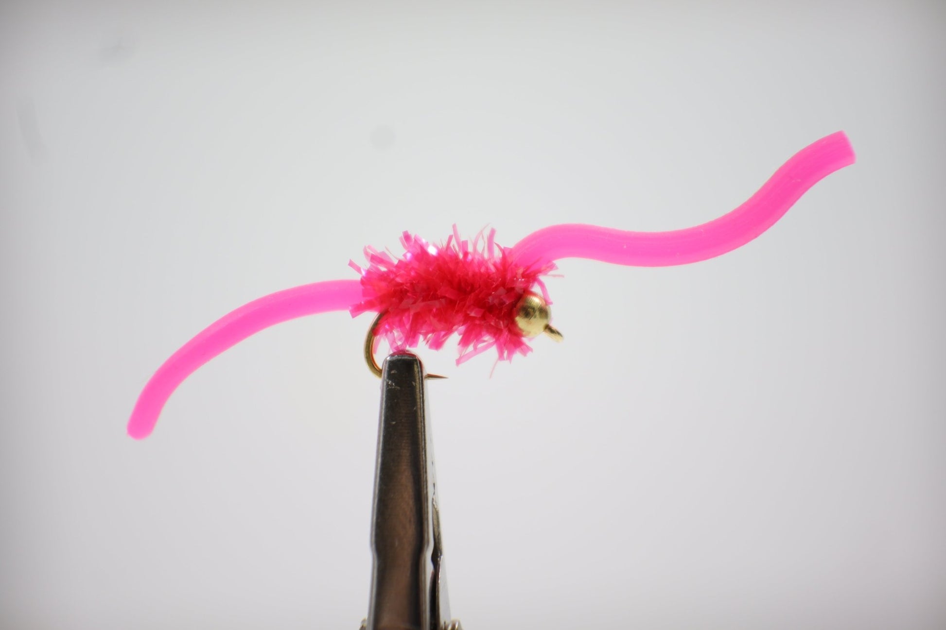 pink /red Squirmy Wormy Fly close up 6